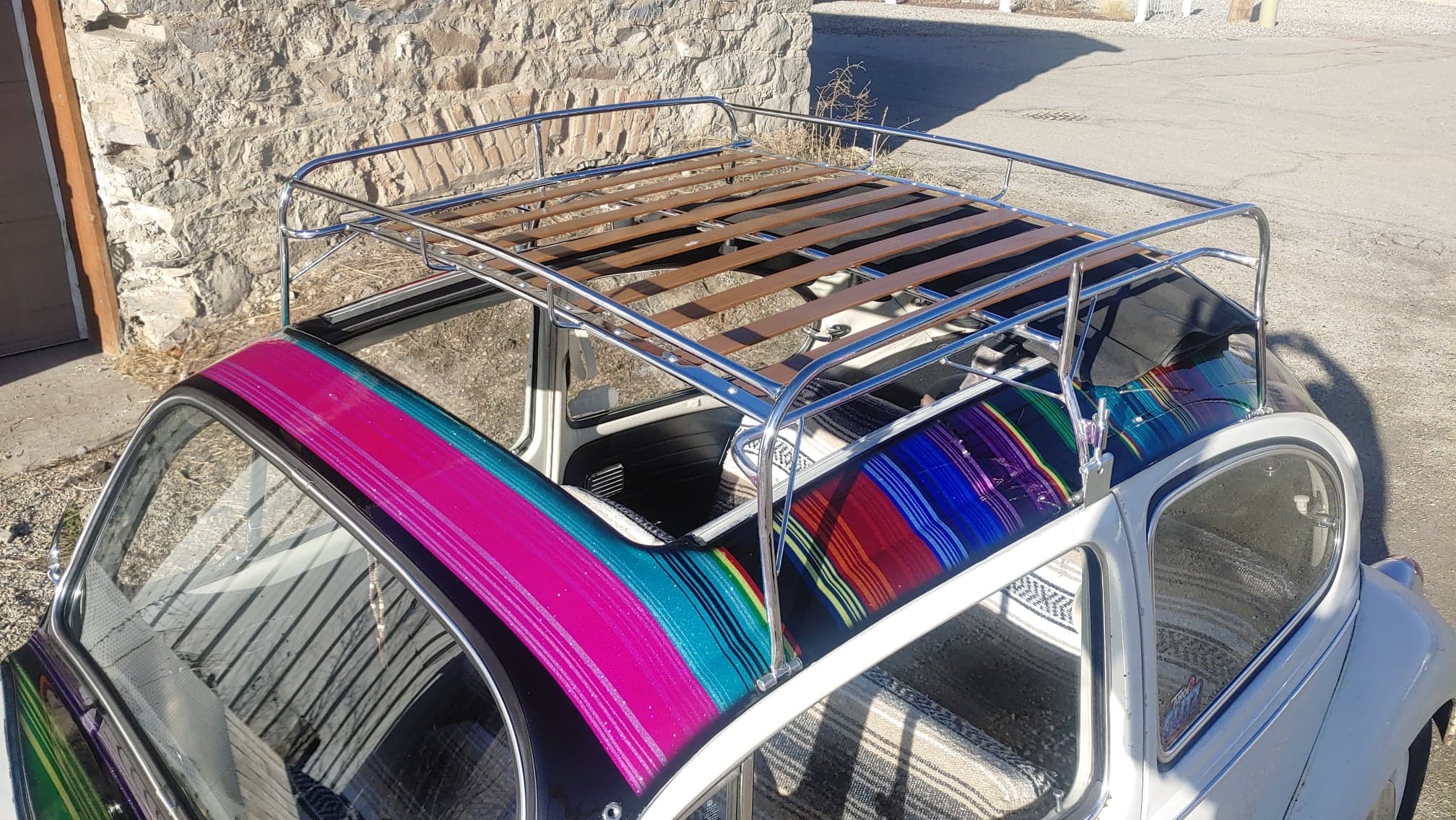 Mike Vano cut a ragtop into his 1969 VW Beetle. Note the tamer serape theme inside.