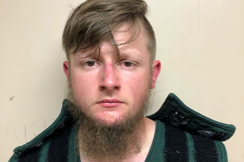 FILE PHOTO: Robert Aaron Long, 21, of Woodstock in Cherokee County poses in a jail booking photograph after he was taken into custody by the Crisp County Sheriff's Office in Cordele, Georgia, U.S. March 16, 2021.