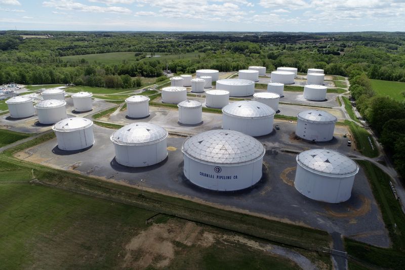 FILE PHOTO: Holding tanks are seen in an aerial photograph at Colonial Pipeline's Dorsey Junction Station in Woodbine, Maryland, U.S. May 10, 2021. REUTERS/Drone Base/File Photo