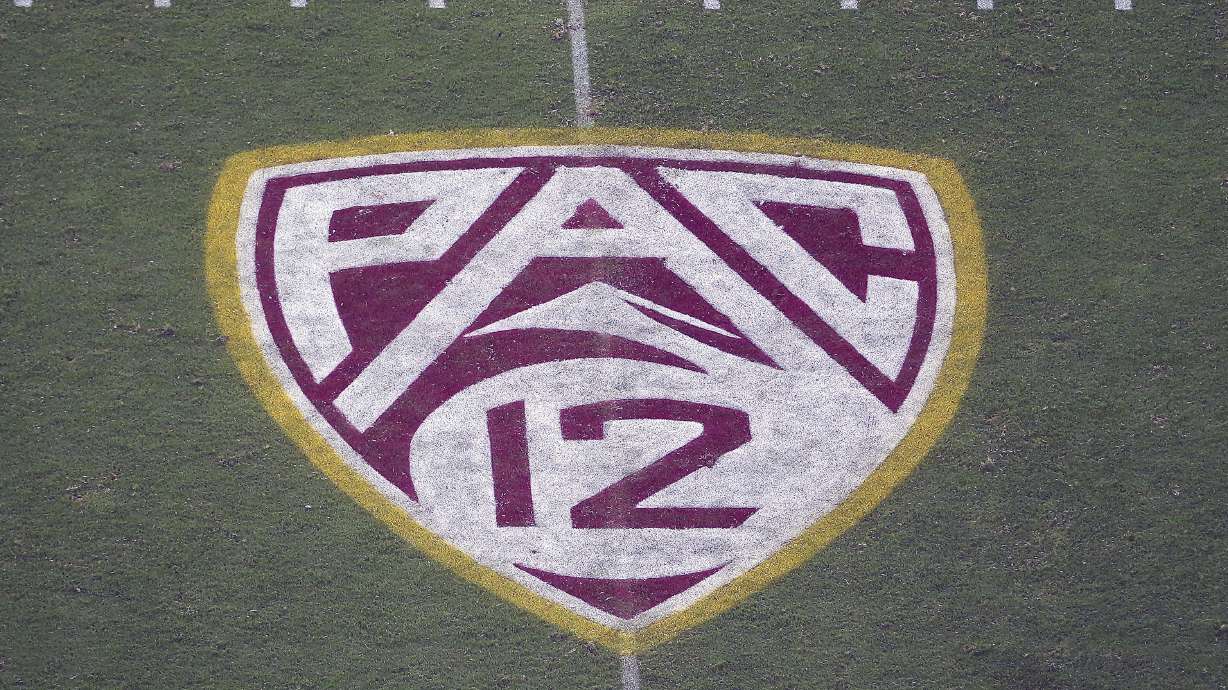 The Pac-12 logo is displayed on the field at Sun Devil Stadium during an NCAA college football game between Arizona State and Kent State in Tempe, Ariz.