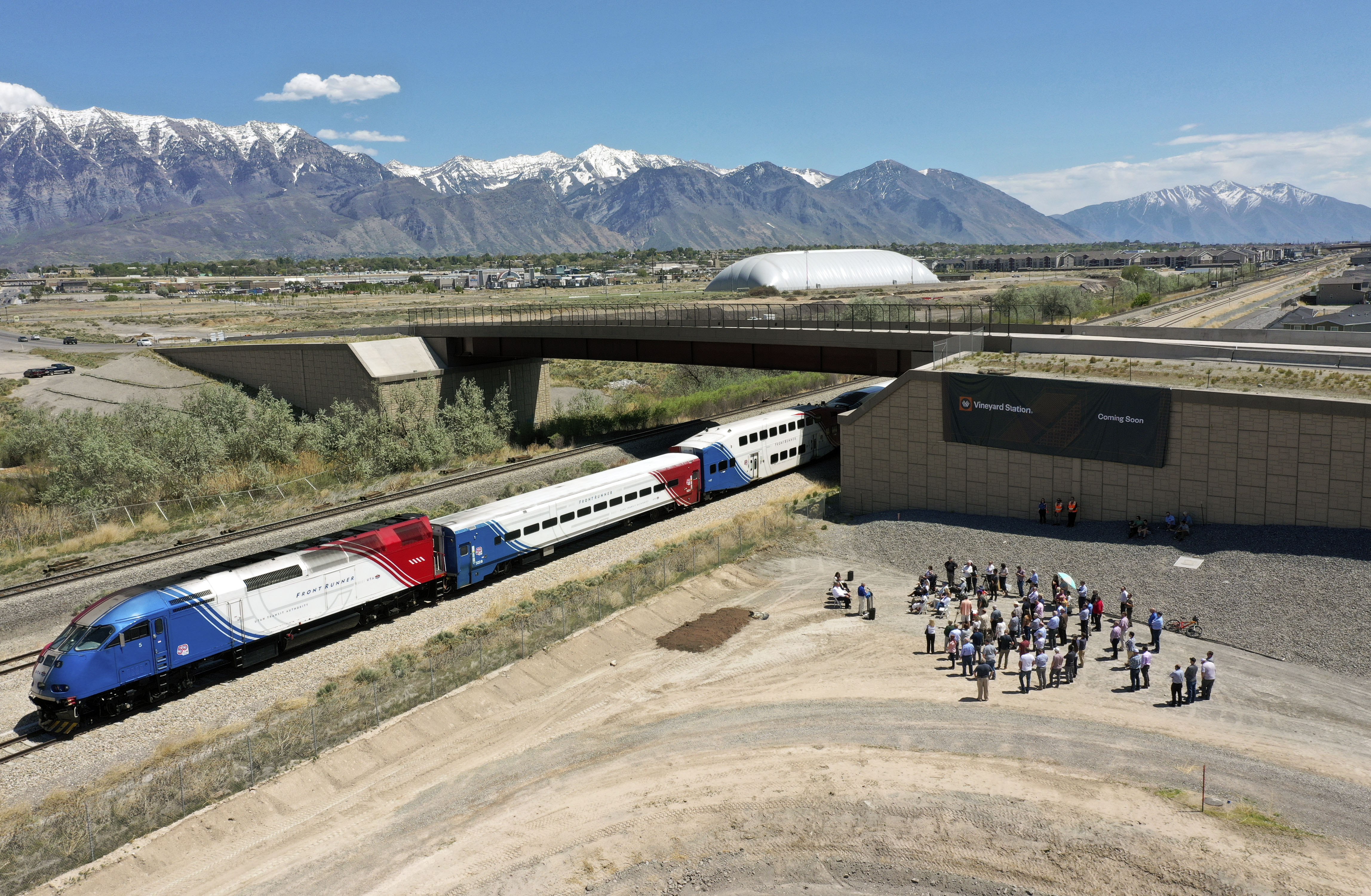 People gather for a groundbreaking ceremony for a new FrontRunner station in Vineyard on May 13. Utah Transit Authority officials say they are pouring concrete and adding a rail switch to the new site over the next week.