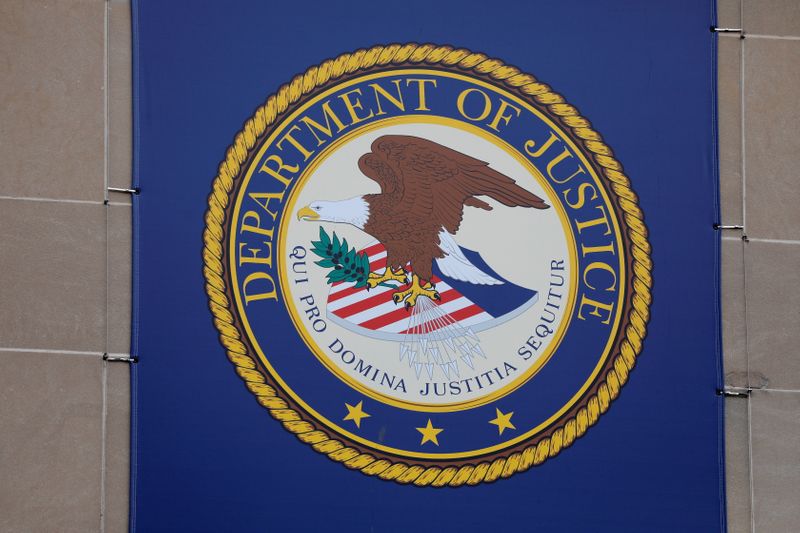 FILE PHOTO: The crest of the United States Department of Justice (DOJ) is seen at their headquarters in Washington, D.C., U.S., May 10, 2021. REUTERS/Andrew Kelly