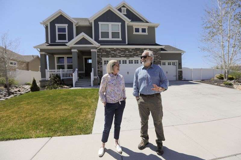 Michelle and Steve Allen pose for a portrait outside of
their home in Heber City on Thursday, May 6, 2021.