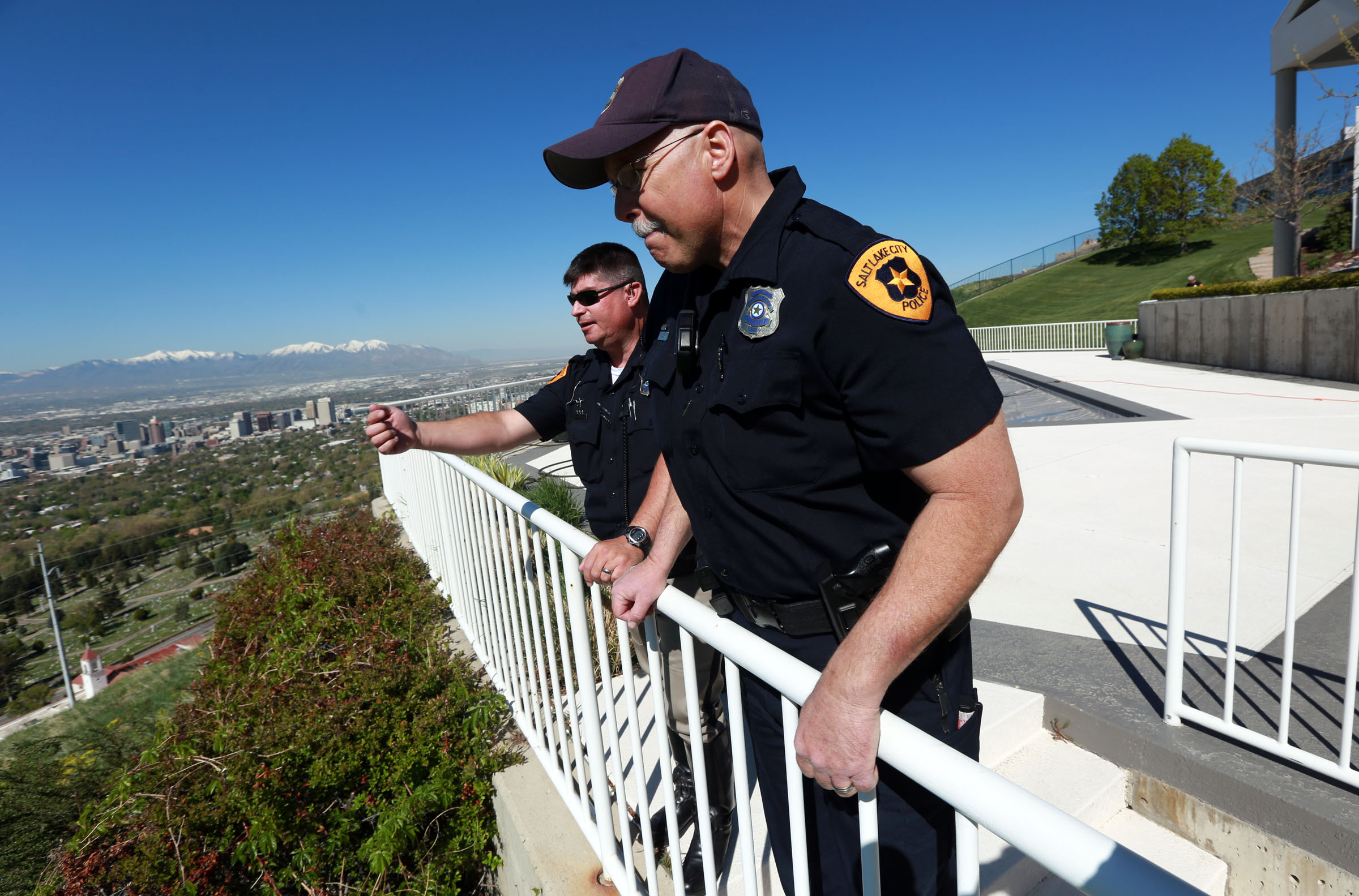 Salt Lake police officers look to see where a 14-year-old boy who has autism slept one night while he was missing in Salt Lake City in this May 1, 2014, file photo.