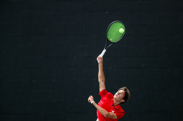 Crimson Cliffsâ?? Max Miner serves against Desert Hillsâ?? Jaden Wittwer in the 1st singles finals match of the 4A boys tennis tournament at Liberty Park in Salt Lake City on Saturday, May 15, 2021.