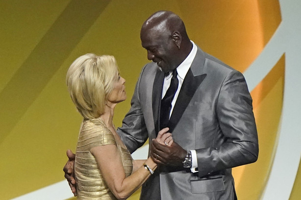 Presenter Michael Jordan, right, congratulates Kim Mulkey after Mulkey, formerly coach at Baylor and now at LSU, was enshrined with the 2020 Basketball Hall of Fame class, Saturday, May 15, 2021, in Uncasville, Conn.