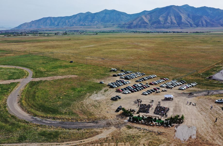 Attendees gather during the Deseret Peak Utah Temple groundbreaking ceremony in Tooele, Utah, on Saturday, May 15, 2021.