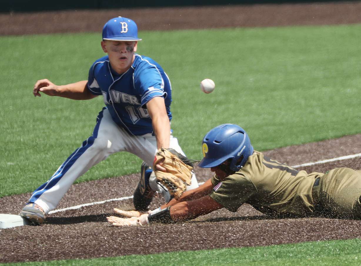 Beaver’s Trayson Hunter (10) can’t come up with the ball on Parowan base runner Nicholas Goodman (10) in the 2A state championship in Orem on Saturday, May 15, 2021.