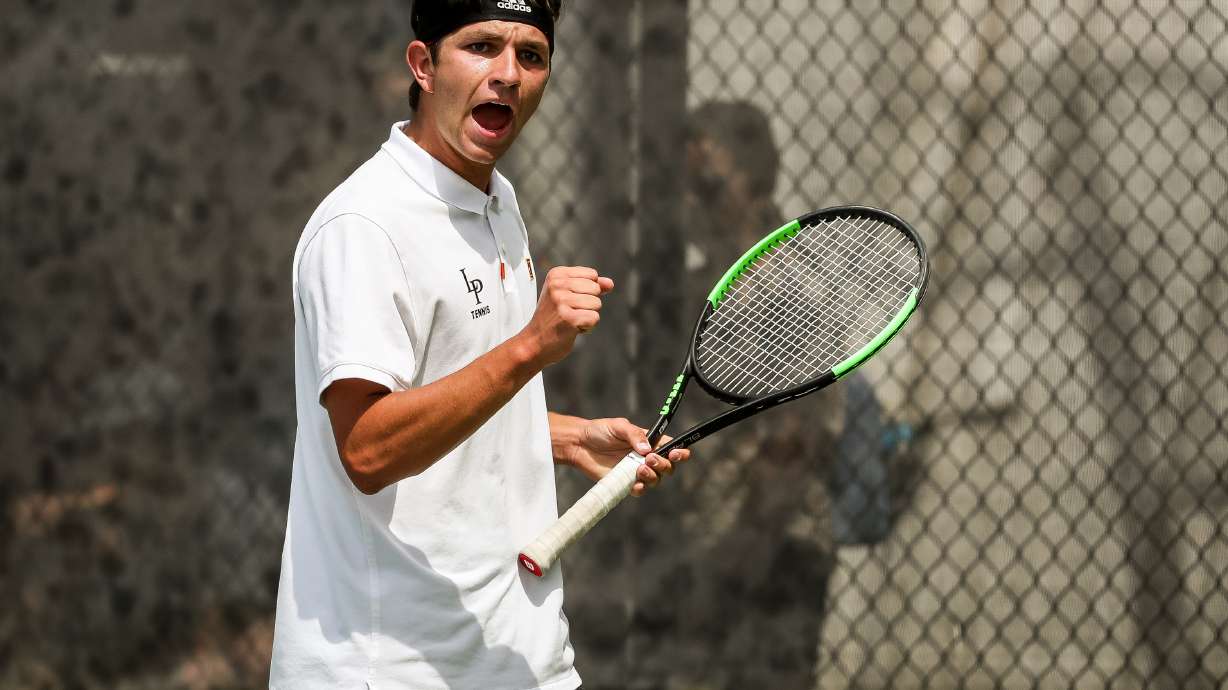 Lone Peakâs TJ Wells celebrates after winning a point against American Forkâs Caden Hasler in the No. 1 singles finals match of the 6A boys tennis tournament at Liberty Park in Salt Lake City on Saturday, May 15, 2021.