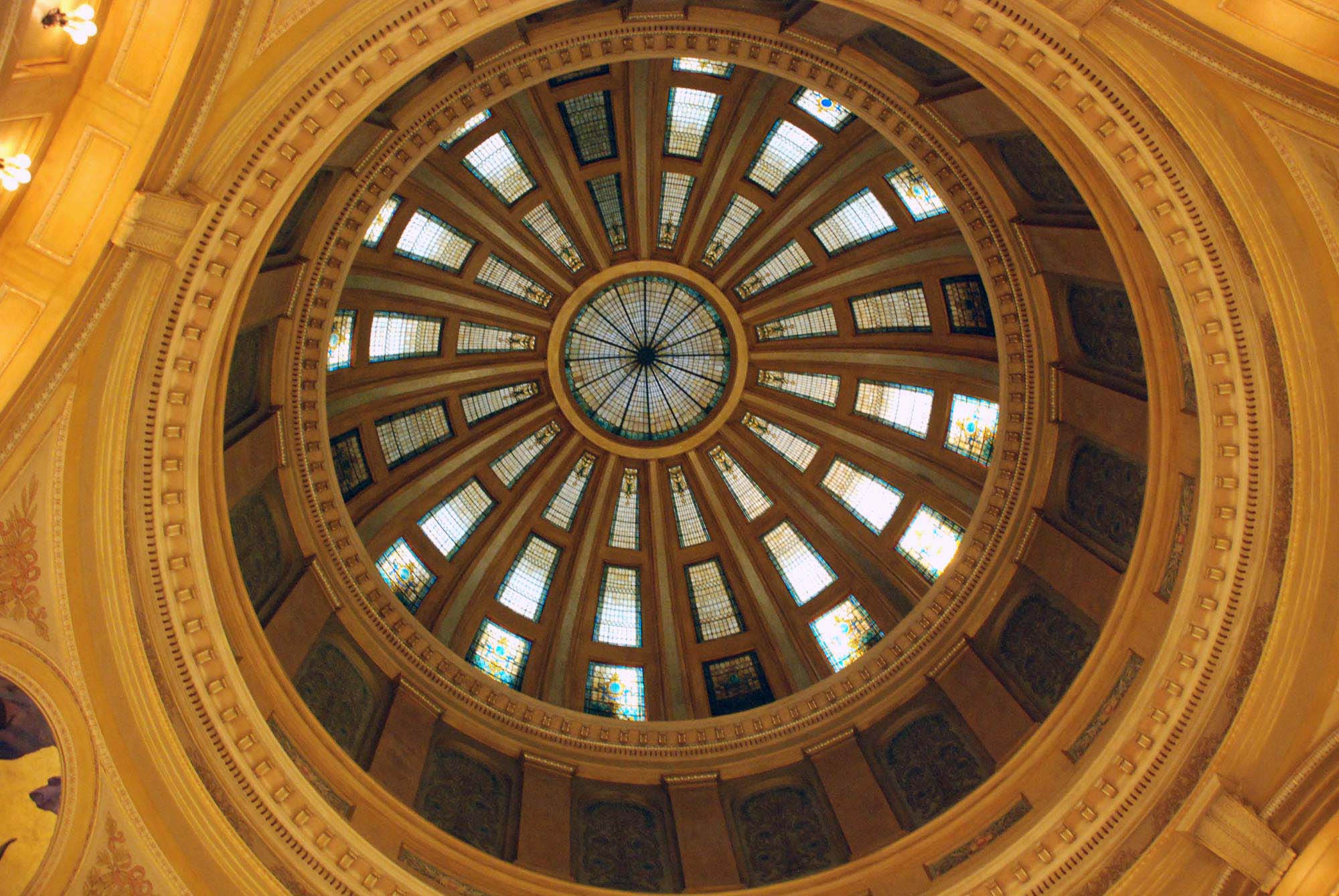 This photo taken Thursday, July 11, 2013, shows the stained glass in the rotunda of the state Capitol in Pierre, S.D.