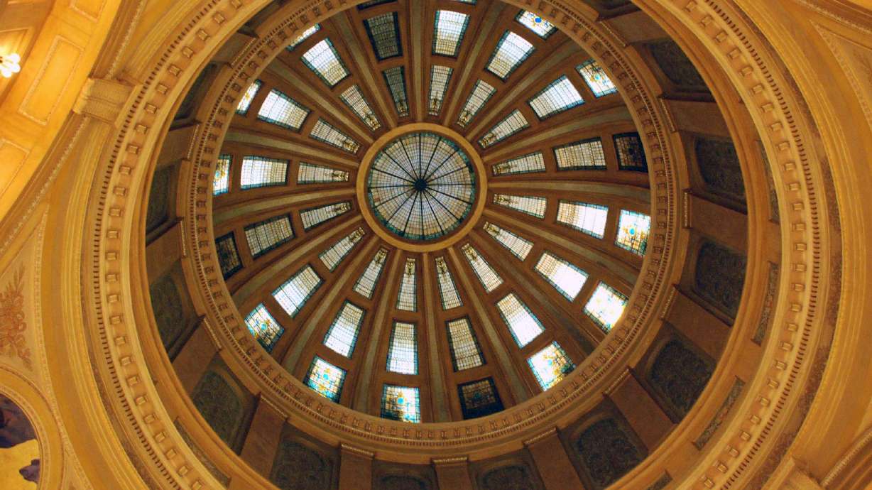 This photo taken Thursday, July 11, 2013, shows the stained glass in the rotunda of the state Capitol in Pierre, S.D.