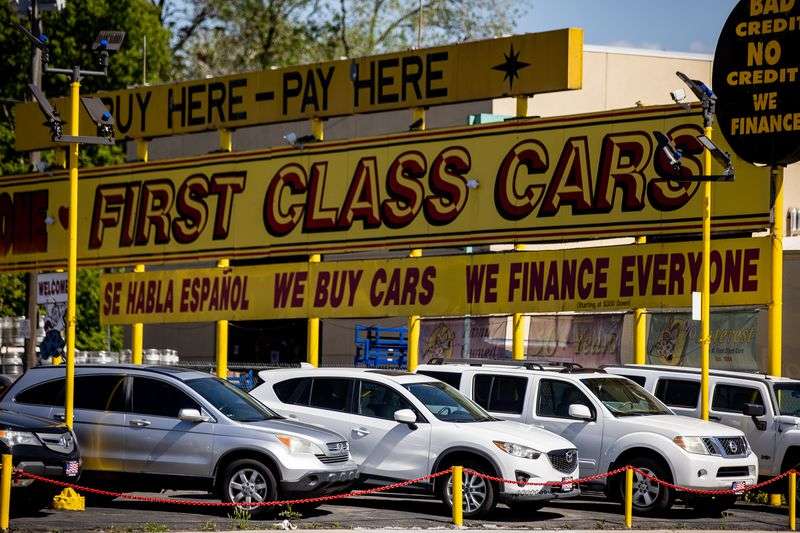 Used cars for sale at First Class Cars in Salt Lake City are pictured on Thursday, May 13, 2021.