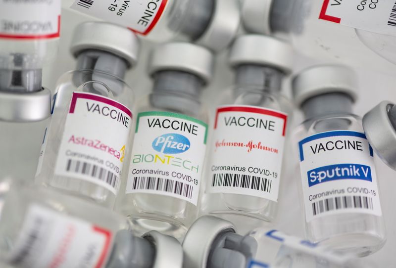 FILE PHOTO: Vials labelled "AstraZeneca, Pfizer - Biontech, Johnson&Johnson, Sputnik V coronavirus disease (COVID-19) vaccine" are seen in this illustration picture taken May 2, 2021. REUTERS/Dado Ruvic/Illustration//File Photo