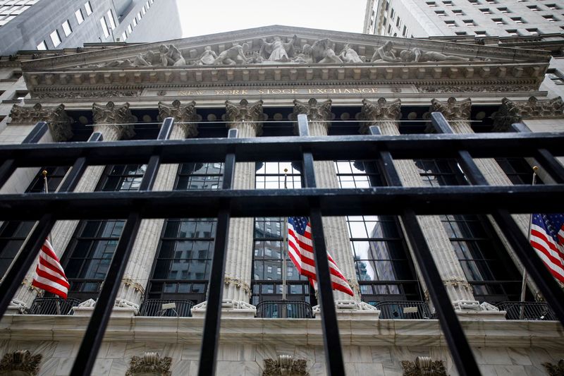 FILE PHOTO: The front facade of the New York Stock Exchange (NYSE) is seen in New York City, U.S., May 4, 2021.  REUTERS/Brendan McDermid/File Photo