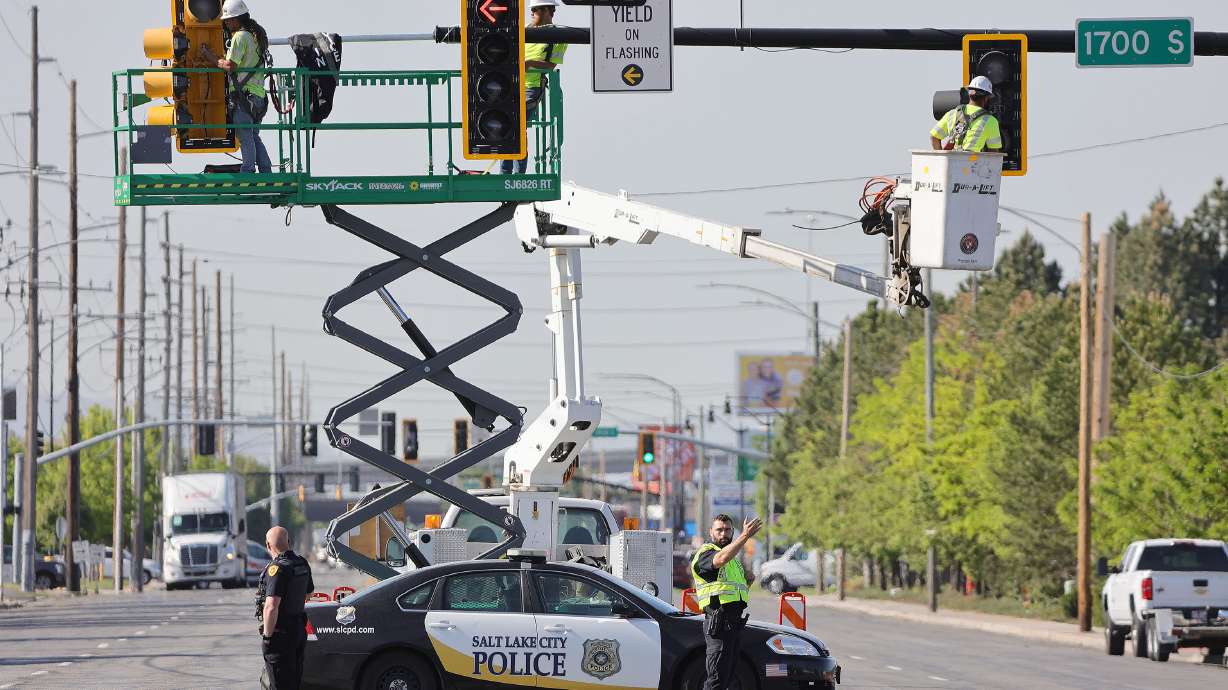 Crews add a traffic light at 1700 South, marking the start of the 300 West reconstruction project in Salt Lake City on Tuesday, May 18, 2021. The street will be reconstructed from 2100 South to 900 South.
