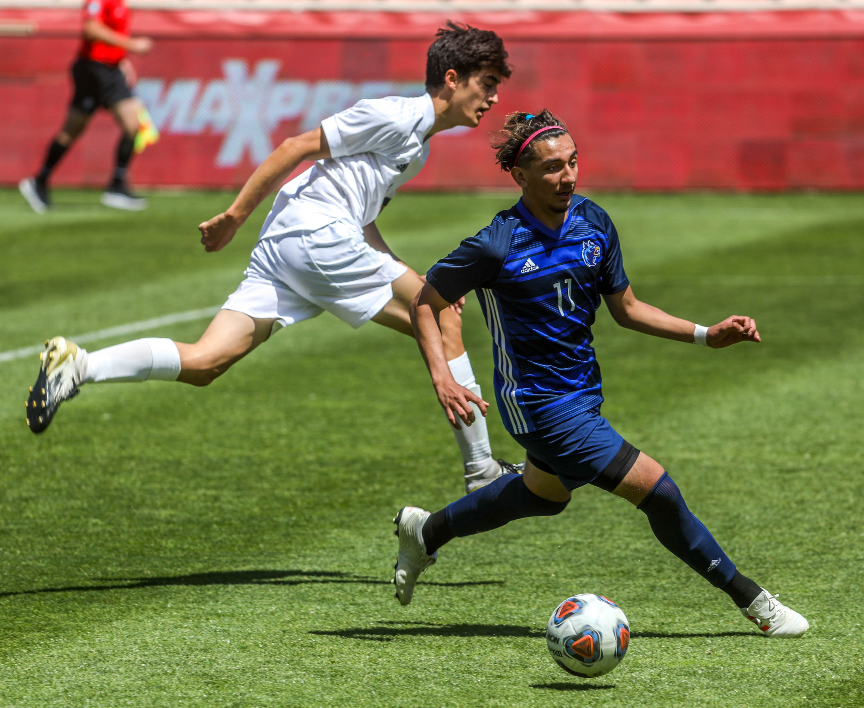 Real Salt Lake Academy's Jordan Martinez (14) controls the ball against Waterford during the 2A boys soccer state championship at Rio Tinto Stadium on Tuesday, May 18, 2021.