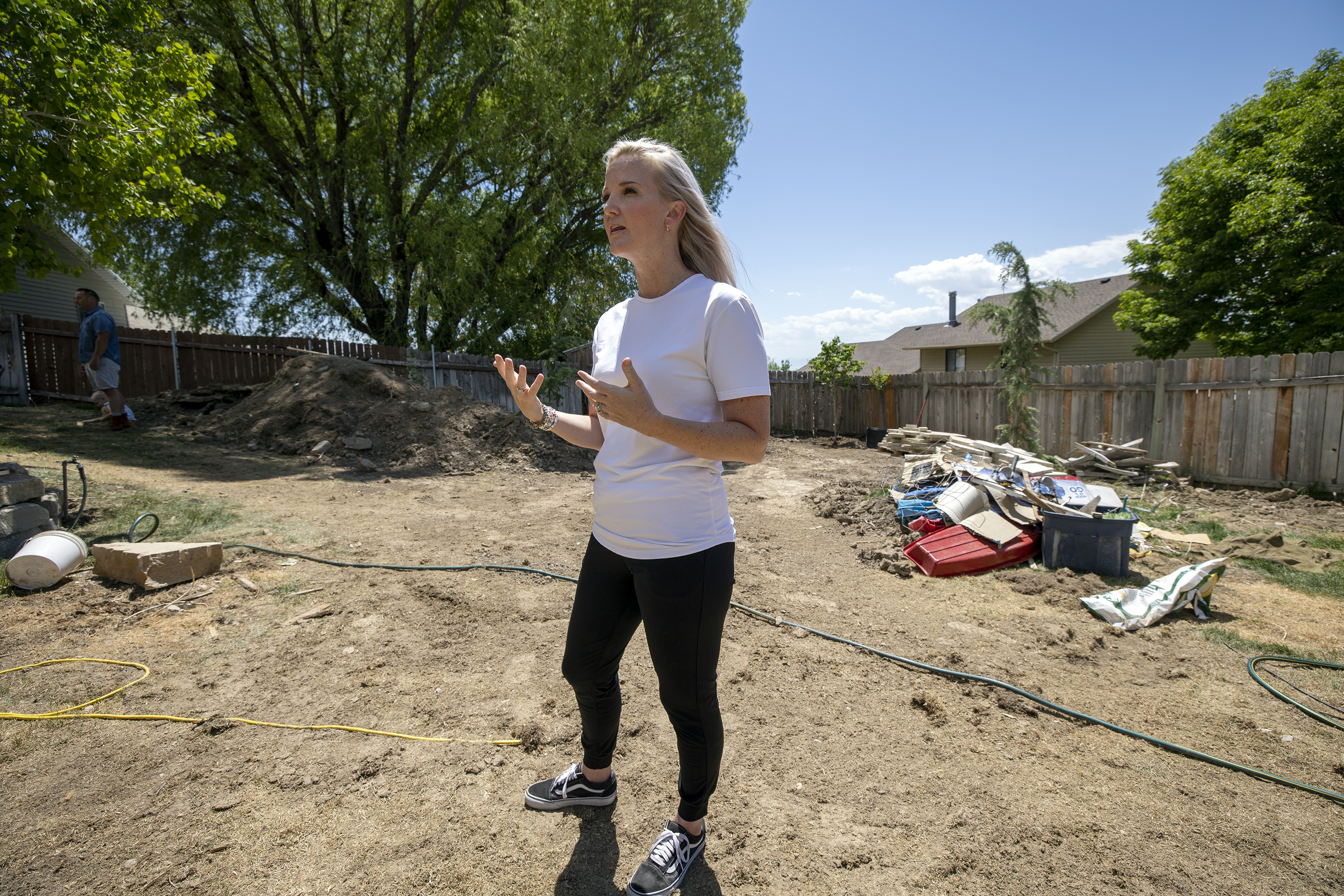 Julia Jolley talks about the integrity of her husband, Cody Jolley, as she stands in the backyard of their home in Pleasant Grove on Tuesday, May 18, 2021.