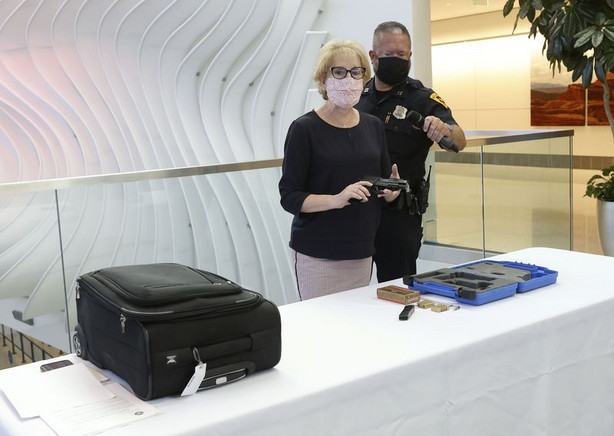 Lorie Dankers, Transportation Security Administration Summer Presser spokesperson, talks about the rules for traveling with a firearm during a press conference at the Salt Lake City International Airport in Salt Lake City on Tuesday, May 18, 2021.
Air travel is expected to increase this summer. Firearms must be unloaded, locked in a secure case and may not be taken in carry-on bags.