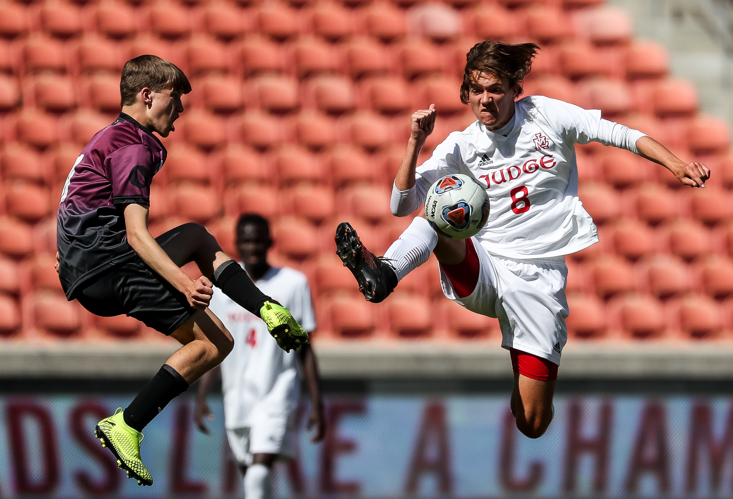 Morgan's Rory Williams and Judge Memorial's Connor Marland try to knock the ball down in the 3A boys soccer championship at Rio Tinto Stadium in Sandy on Tuesday, May 18, 2021.