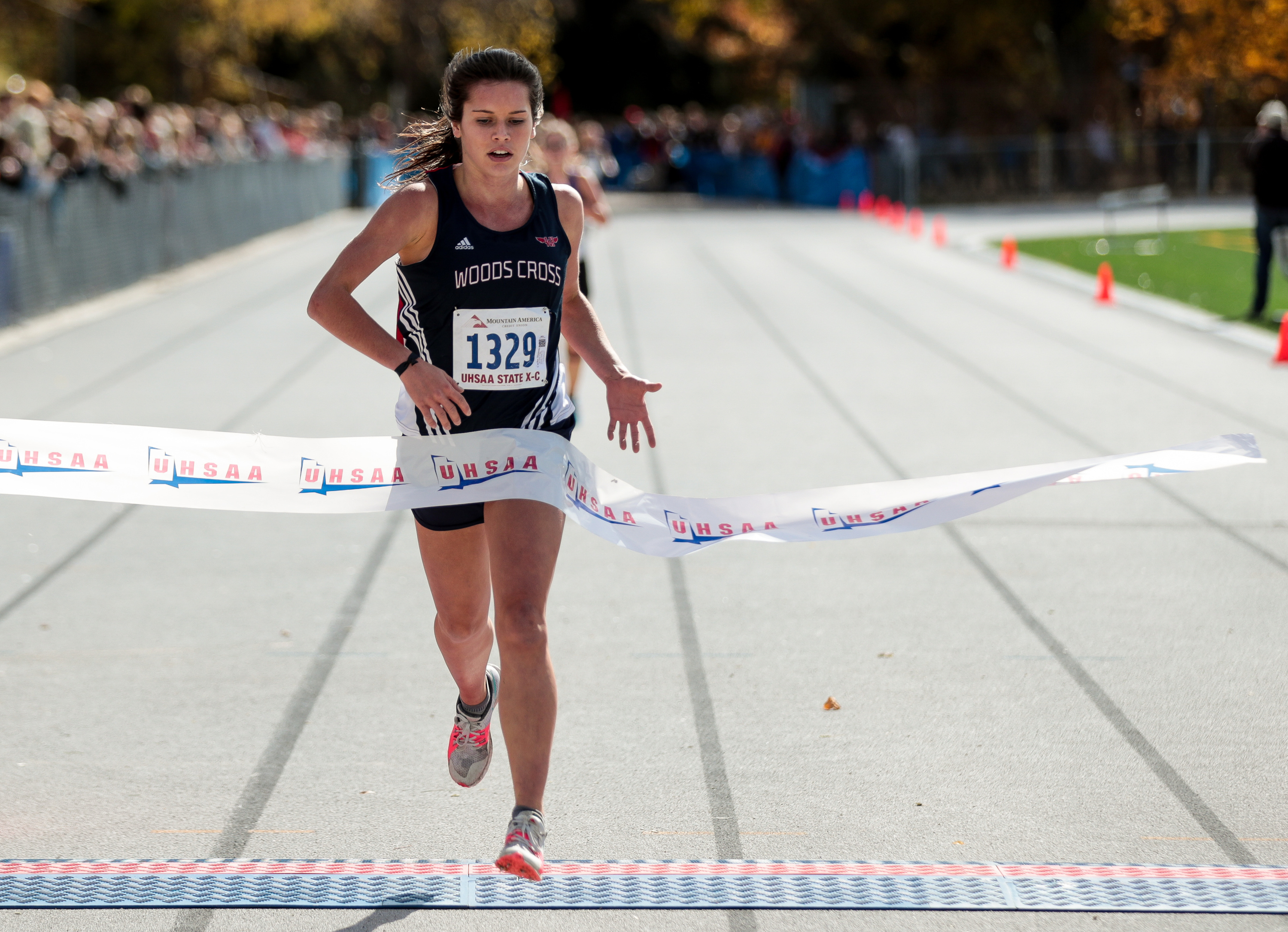 Carlee Hansen of Woods Cross places first in the 5A Girls State Cross-Country Championships at Highland High School in Salt Lake City on Wednesday, Oct. 23, 2019.