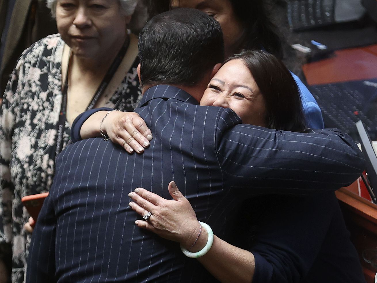 House Speaker Brad Wilson, R-Kaysville, hugs Rep. Karen
Kwan, D-Murray, after Kwan’s resolution honoring Asian
American and Pacific Islander communities passed unanimously
in the House during a special session of the Legislature at the
Capitol in Salt Lake City on Wednesday, May 19, 2021.