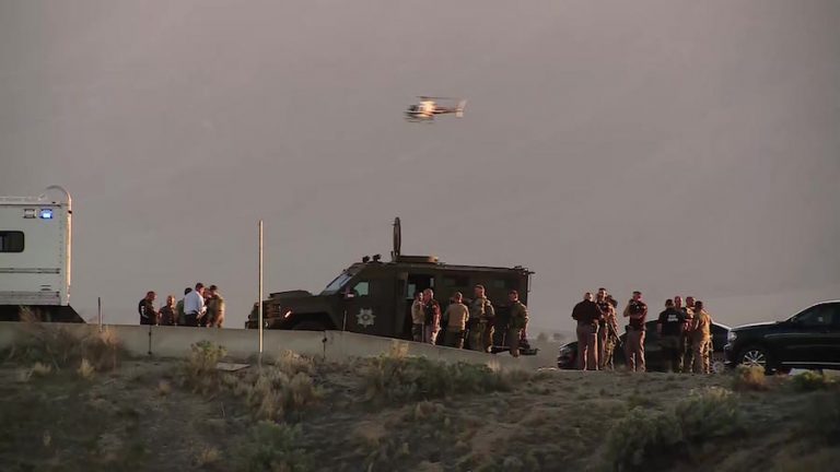 Suspect in manhunt, police shootout also shot man he was carjacking