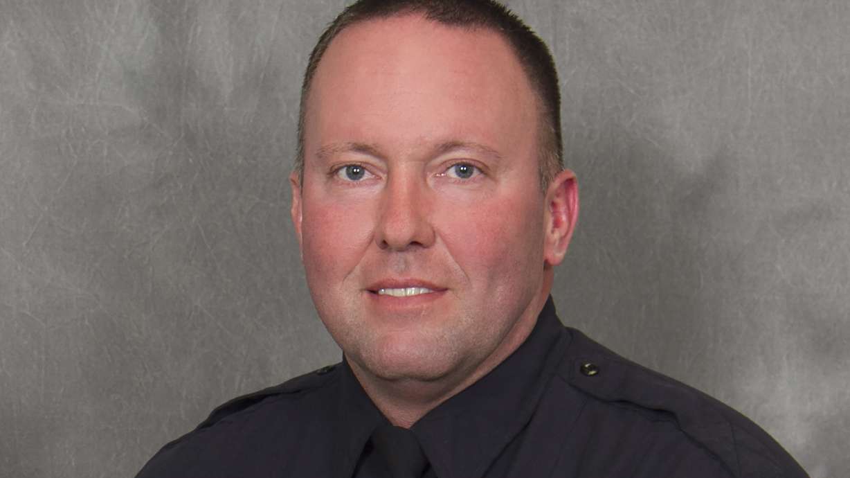 Slain officer's body escorted through central Illinois