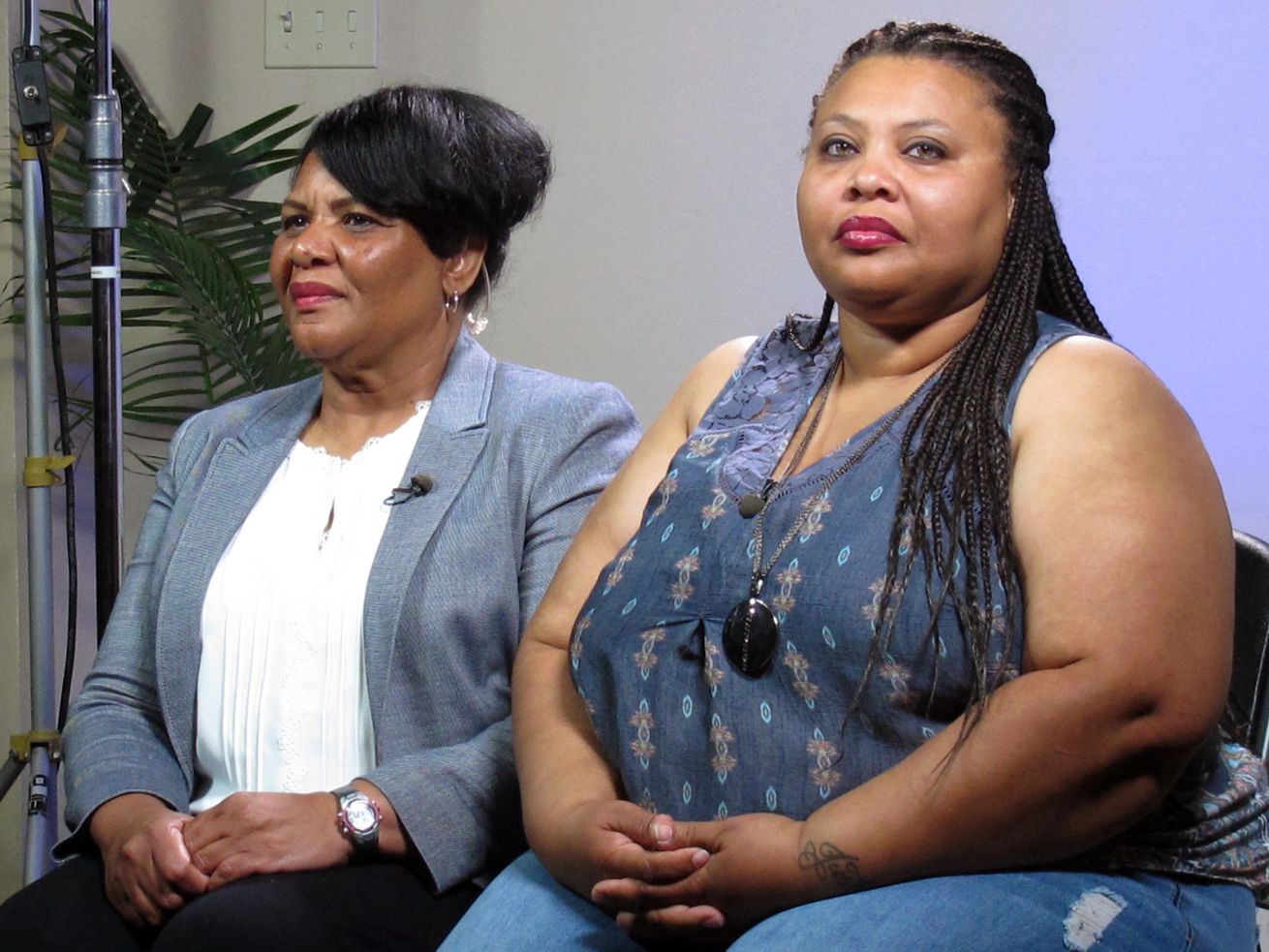 Alice Marie Johnson, left, and her daughter, Katina
Marie Scales, wait to start a TV interview in Memphis, Tenn., on
June 7, 2018. Crystal Munoz, a 40-year-old Texas woman, was among
nearly a dozen people granted clemency Feb. 18, 2020, by President
Donald Trump after her case was championed by Johnson, who herself
got clemency at the urging of reality TV star Kim Kardashian West.
Johnson, spent years with Munoz at a federal prison in Fort Worth,
Texas.