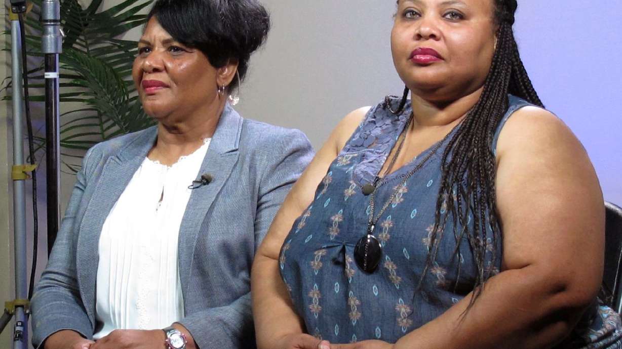 Alice Marie Johnson, left, and her daughter, Katina
Marie Scales, wait to start a TV interview in Memphis, Tenn., on
June 7, 2018. Crystal Munoz, a 40-year-old Texas woman, was among
nearly a dozen people granted clemency Feb. 18, 2020, by President
Donald Trump after her case was championed by Johnson, who herself
got clemency at the urging of reality TV star Kim Kardashian West.
Johnson, spent years with Munoz at a federal prison in Fort Worth,
Texas.