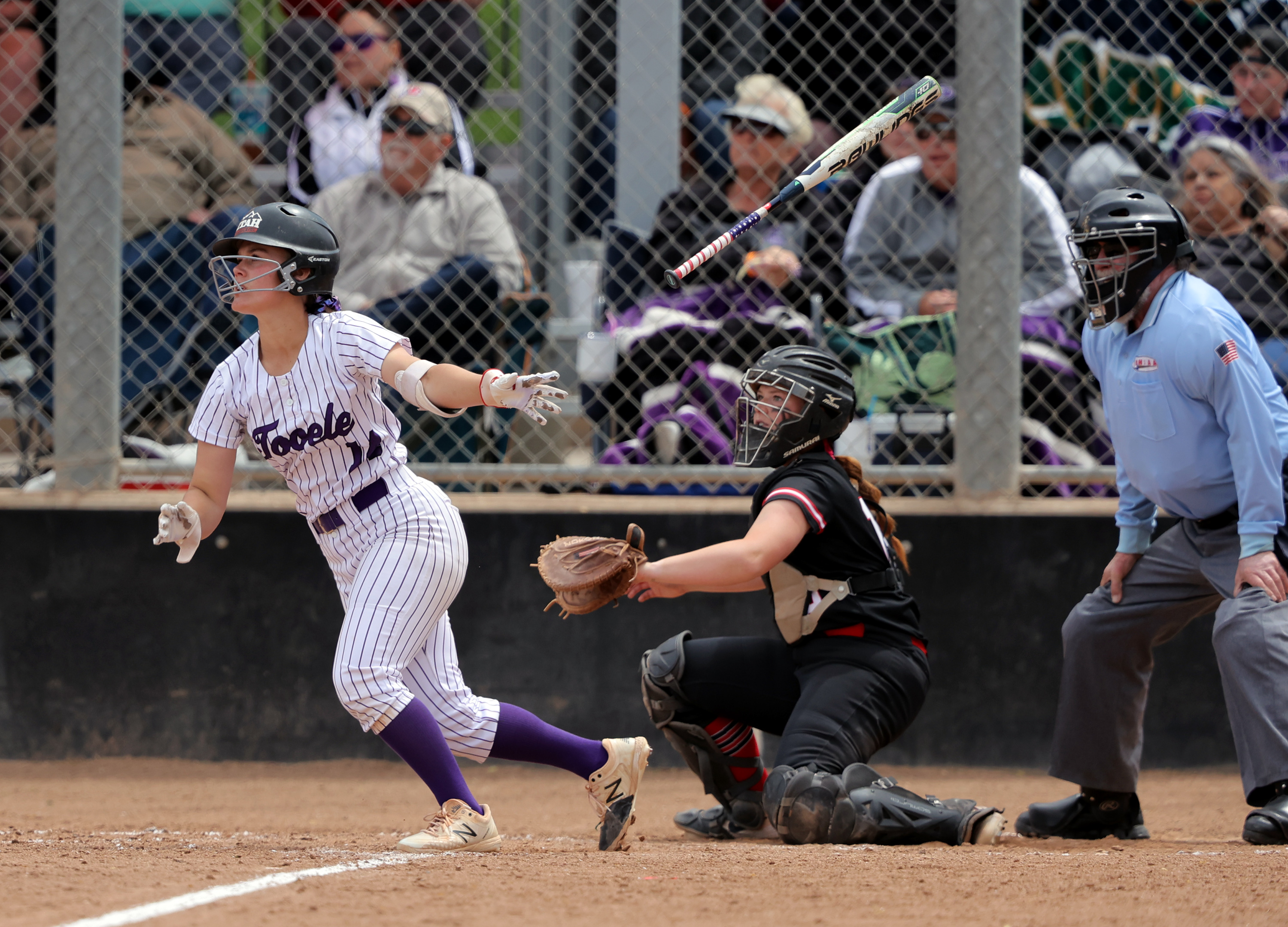 Tooele's Attlyn Johnston lets her bat fly after hitting the ball as they and Bear River play for the 4A championship in Softball in Spanish Fork on Saturday, May 22, 2021. Bear River won both games.