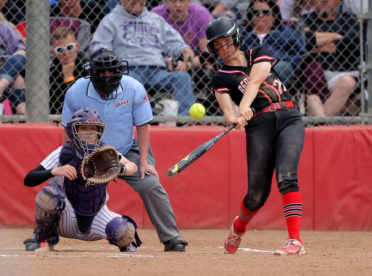 Bear River Cami Gibbs smacks a three run home run as they and Tooele play for the 4A championship in Softball in Spanish Fork on Saturday, May 22, 2021. Bear River won both games.