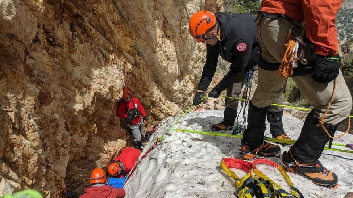 Salt Lake County Sheriff's Search and Rescue works to recover the body of a climber who slid on the West Slabs of Mount Olympus on May 22, 2021.