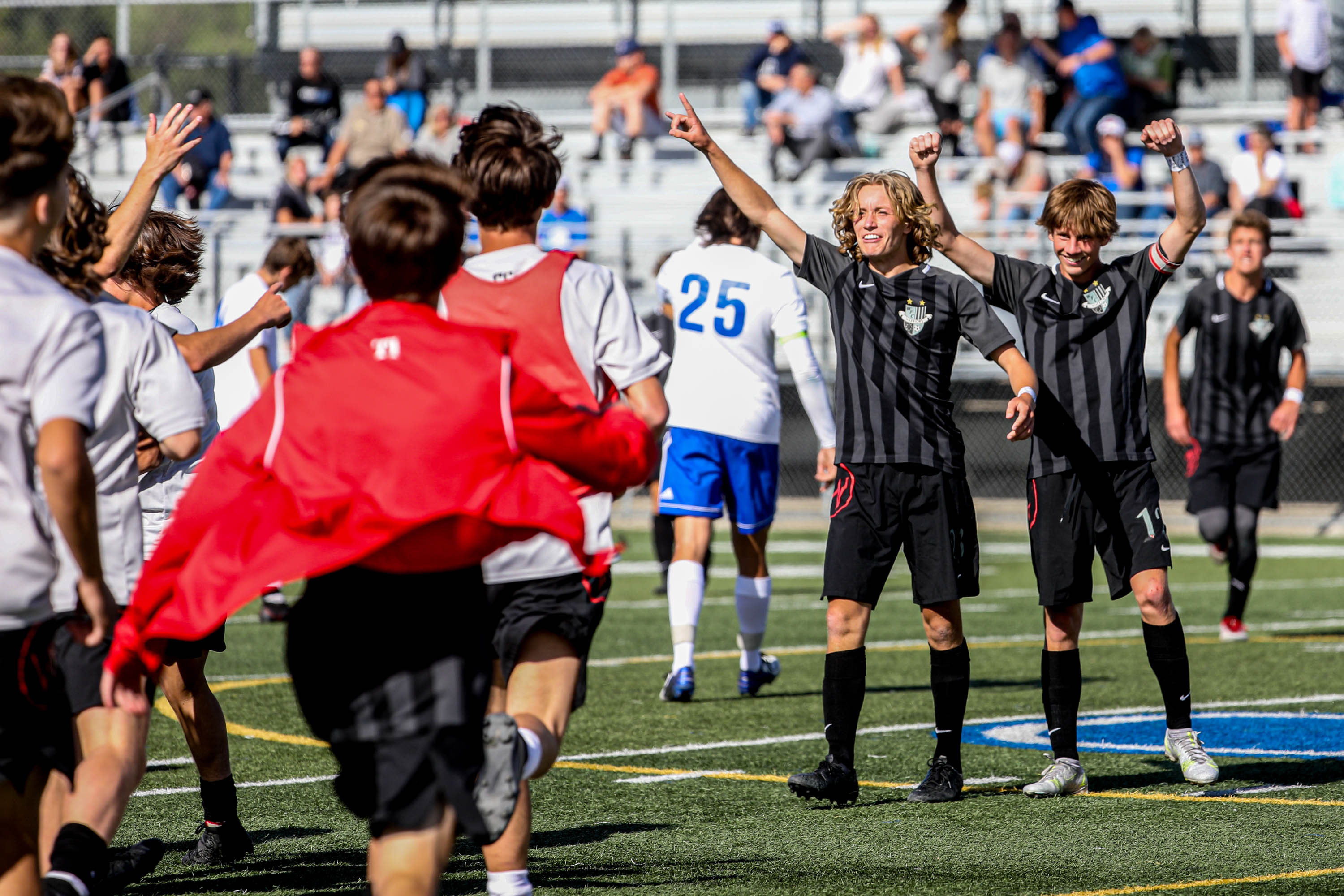 Weber Warriors celebrate their win in the 6A boys soccer semifinals against the Fremont Silverwolves at Juan Diego Catholic High School in Draper on Monday, May 24, 2021.