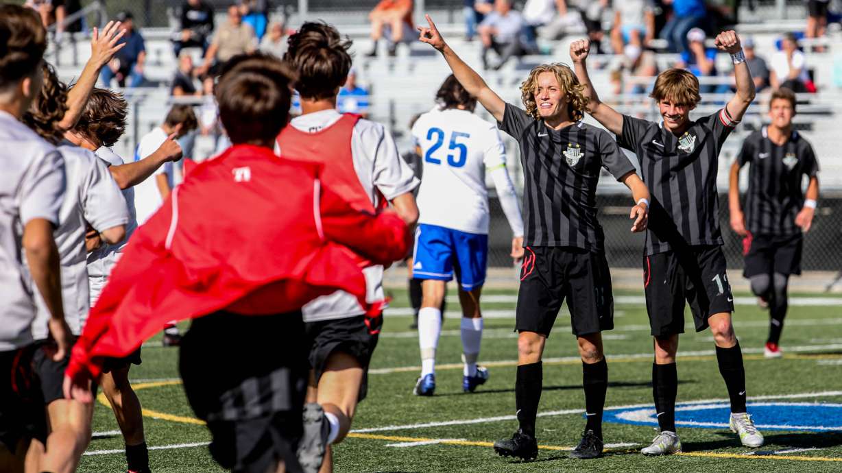 Weber Warriors celebrate their win in the 6A boys soccer semifinals against the Fremont Silverwolves at Juan Diego Catholic High School in Draper on Monday, May 24, 2021.