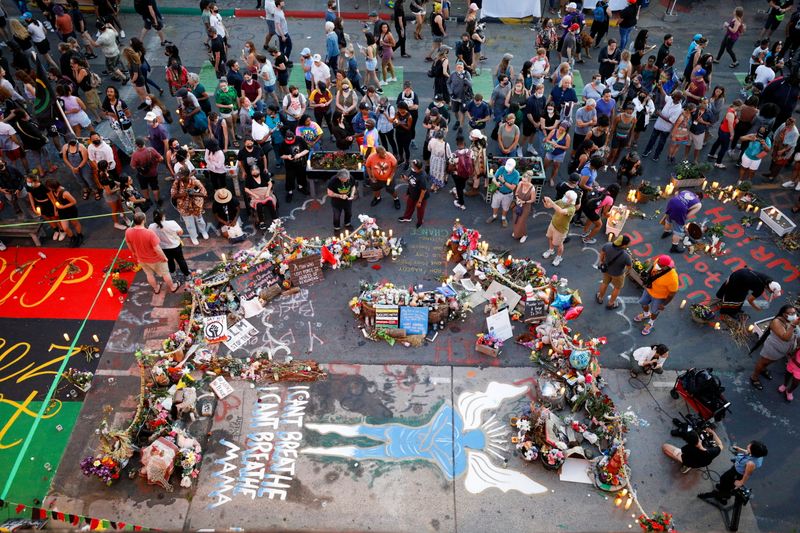 People gather at the George Floyd Square to commemorate the first anniversary of Floyd's death, in Minneapolis, Minnesota, U.S., May 25, 2021.