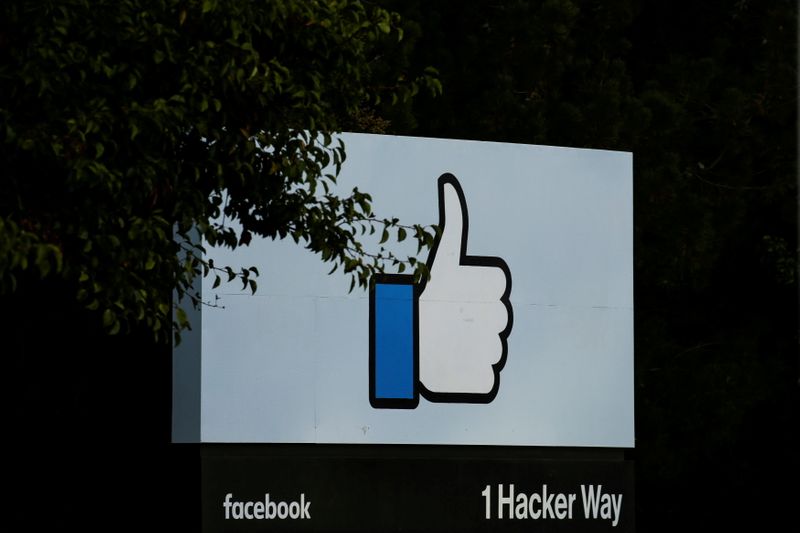FILE PHOTO: The entrance sign to Facebook headquarters is seen in Menlo Park, California, on Wednesday, Oct. 10, 2018. REUTERS/Elijah Nouvelage/File Photo