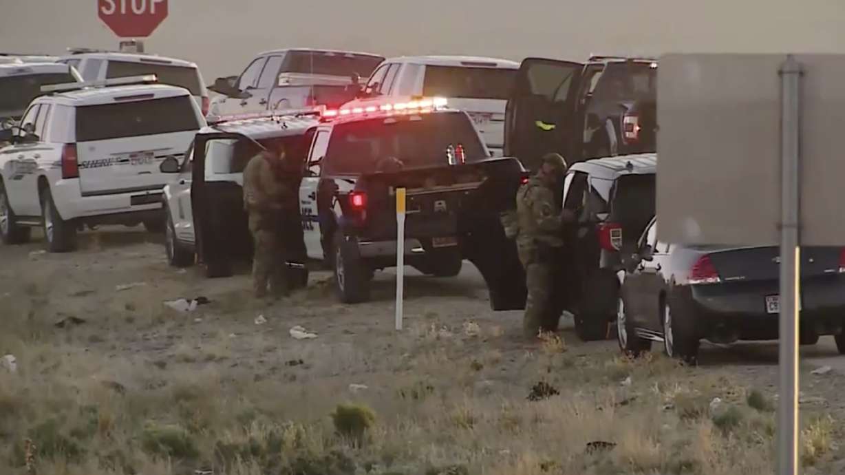 A man was taken into custody Wednesday, May 19, 2021, after he allegedly stole a deputy's SUV and fled in it, causing police to shut down I-15 for hours in both directions during a search that included officers being shot at, officials said.