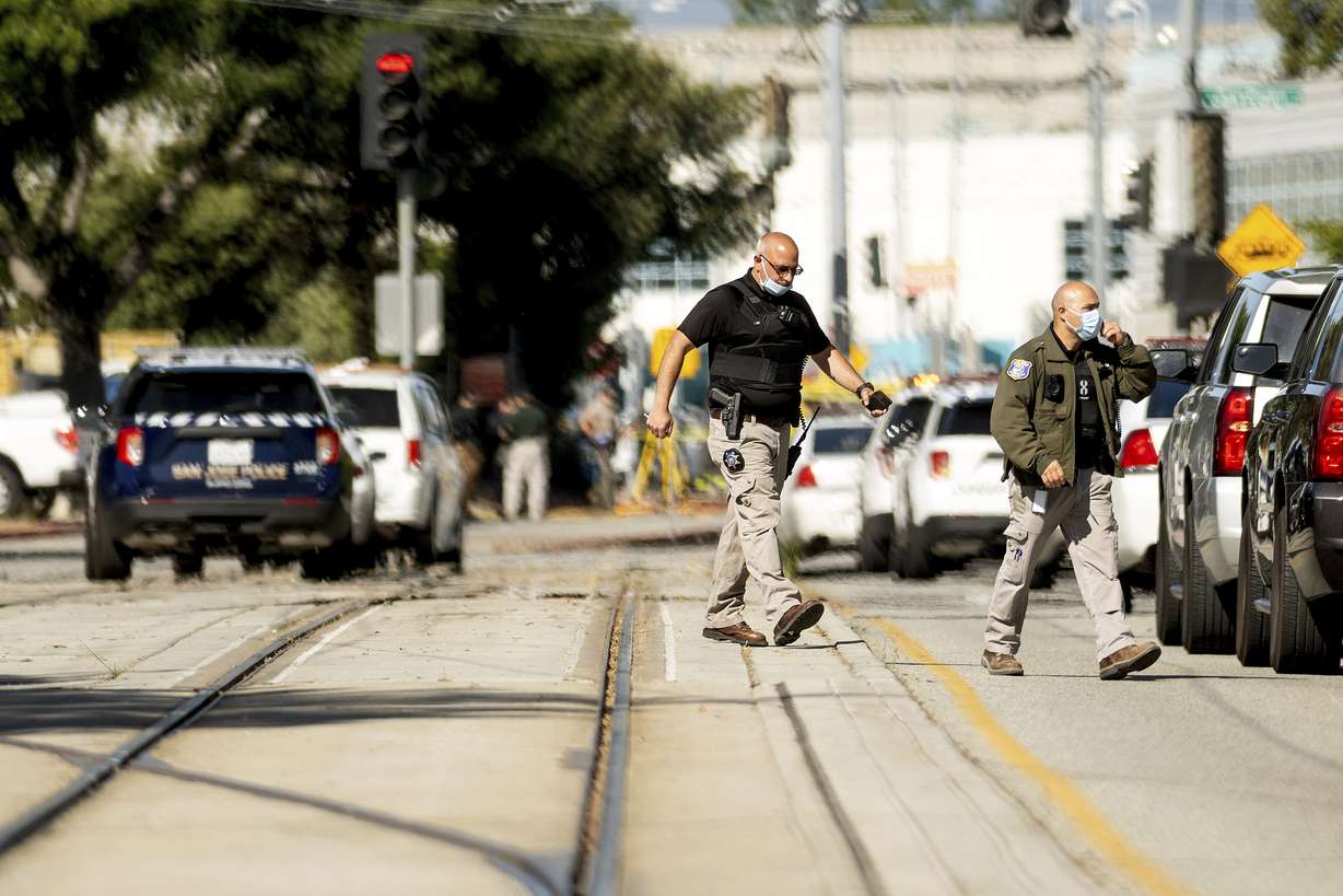 Law enforcement officers respond to the scene of a shooting at a Santa Clara Valley Transportation Authority (VTA) facility on Wednesday, May 26, 2021, in San Jose, Calif. Santa Clara County sheriff's spokesman said the rail yard shooting left multiple people, including the shooter, dead.