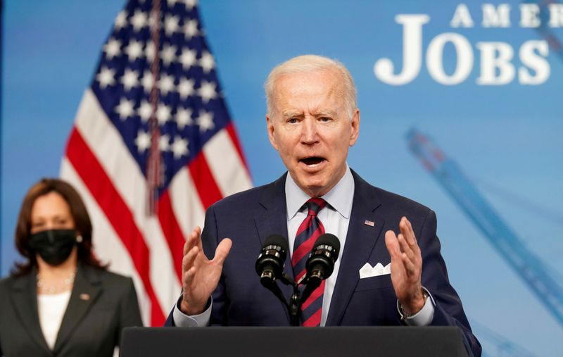 FILE PHOTO: U.S. President Joe Biden speaks about jobs and the economy at the White House in Washington, U.S., April 7, 2021. REUTERS/Kevin Lamarque