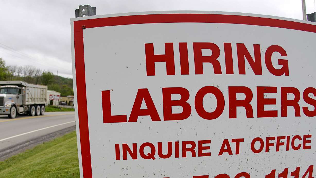 US jobless claims fall to 406,000, a new pandemic low