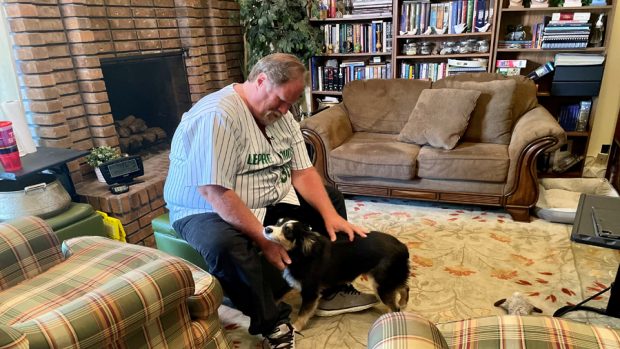 Charlie Ellis relies on his emotional support dog, Izzie, to help him manage his depression and bipolar disorder. His difficult experience during a mental health crisis became an impetus for change.