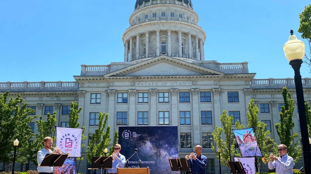 Members of the Utah Symphony open up a press conference held on May 27.
