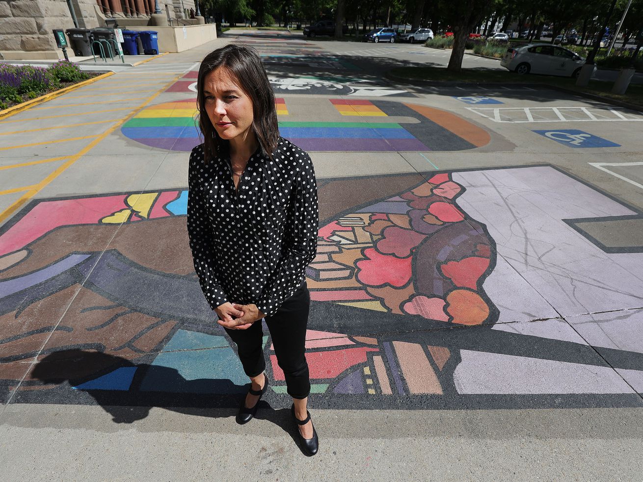 Salt Lake City Mayor Erin Mendenhall stands on the
Black Lives Matter mural outside of the City-County Building
on Wednesday, May 26, 2021, as she reflects on the year since
George Floyd’s killing and the social unrest that ensued.