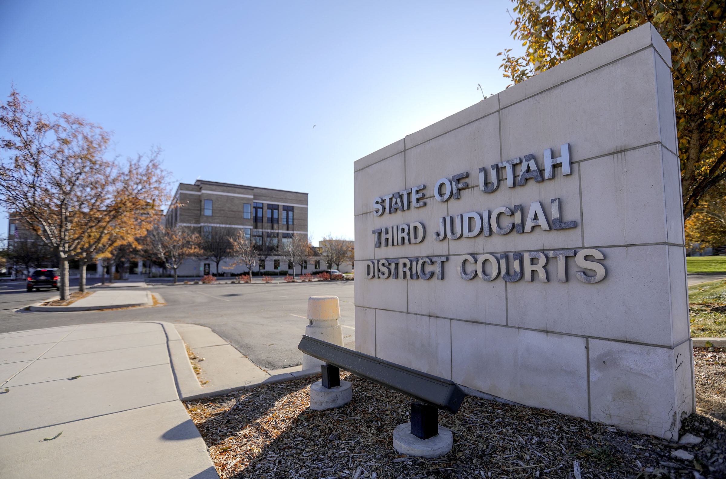 A man who police say slammed into the back of a Utah Highway Patrol vehicle, injuring the trooper, was criminally charged at 3rd District Court on Tuesday.