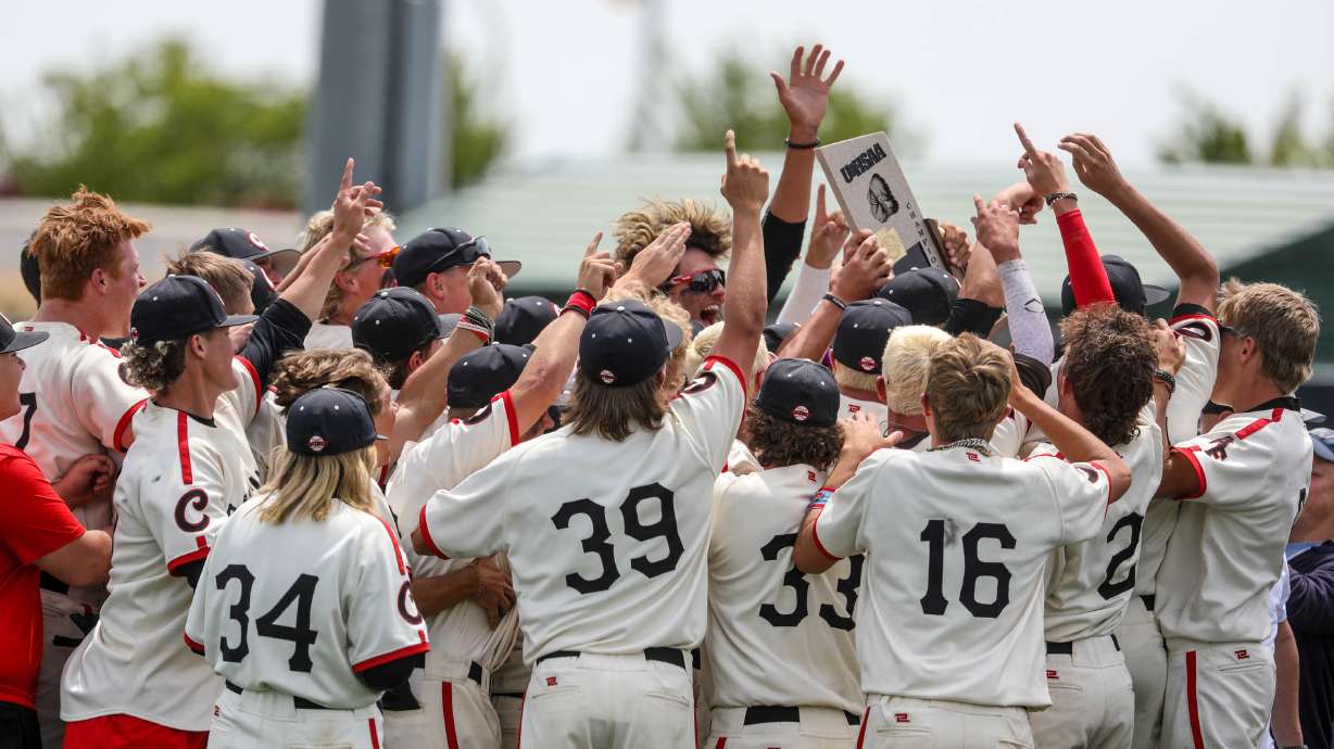 The American Fork Cavemen celebrate during game two of the 6A baseball championship where they faced off against the Pleasant Grove Vikings at UCCU Ballpark in Orem on Saturday, May 29, 2021. The Cavemen won, 8-0.