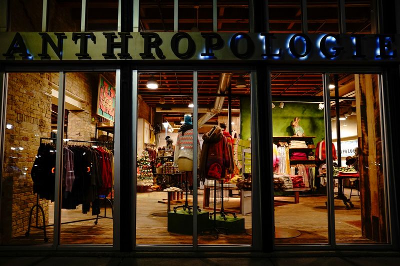 FILE PHOTO: A closed Anthropologie women's clothing store is seen at night in Milwaukee's Historic Third Ward neighborhood, as the coronavirus disease (COVID-19) outbreak continues in Milwaukee, Wisconsin, U.S., October 31, 2020. Picture taken October 31, 2020. REUTERS/Bing Guan