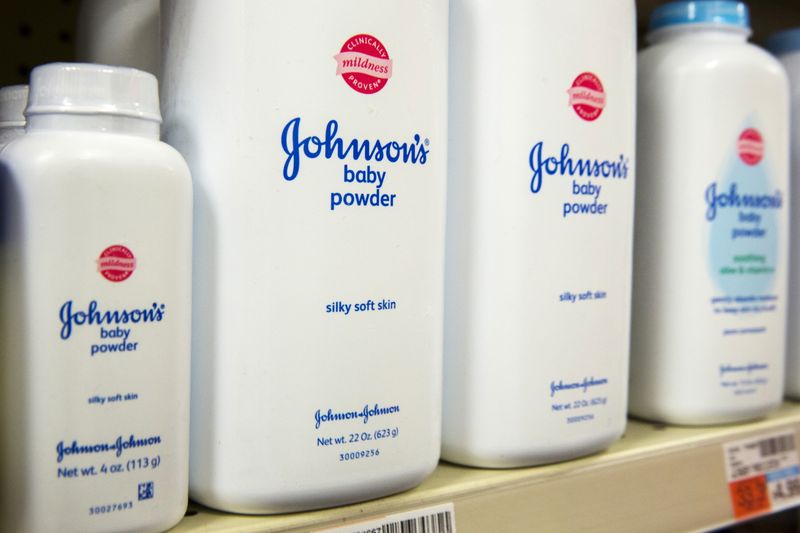 FILE PHOTO: Bottles of Johnson & Johnson baby powder line a drugstore shelf in New York October 15, 2015.  REUTERS/Lucas Jackson
