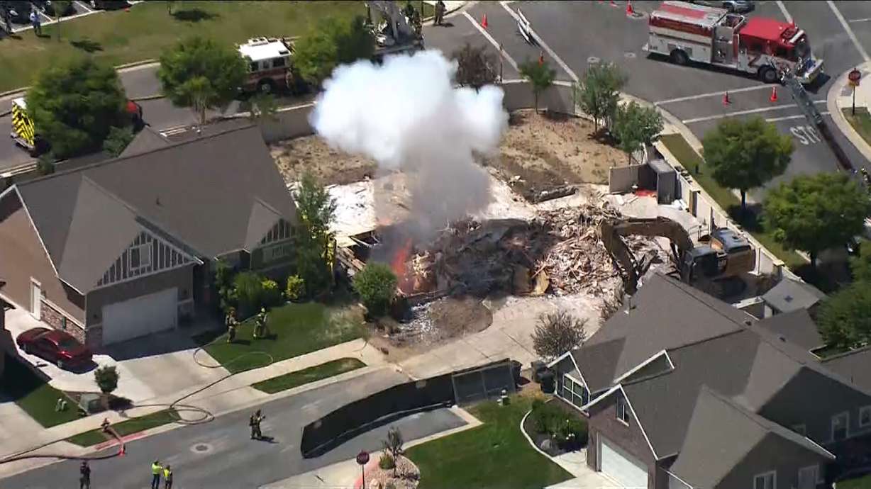 Crews began demolishing a home at 3371 W. Snow Moon Place in South Jordan on June 1, 2021. Ryan McManigal was sentenced to prison Tuesday for making weapons of mass destruction in the home.