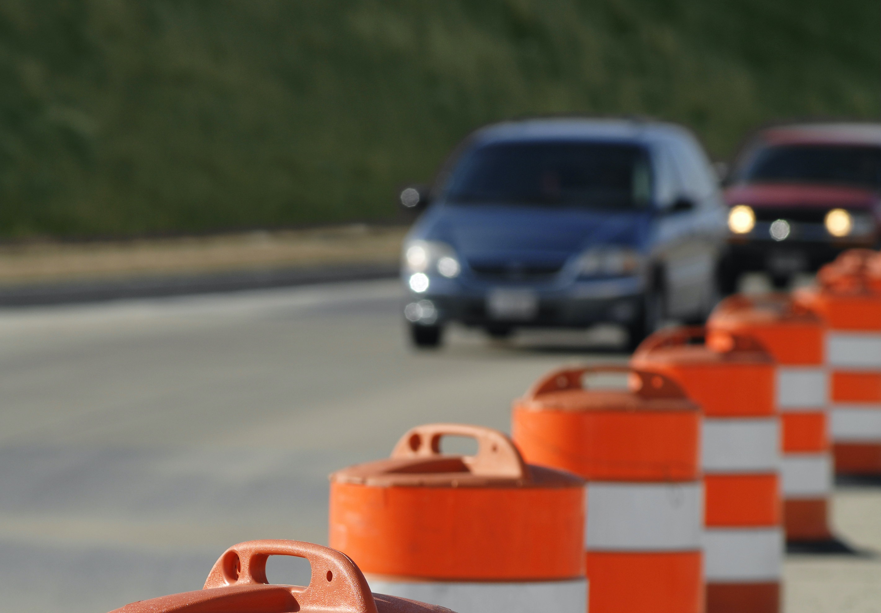 A man was arrested in Garfield County after Utah Highway Patrol troopers say he hit two road crew employees while impaired.