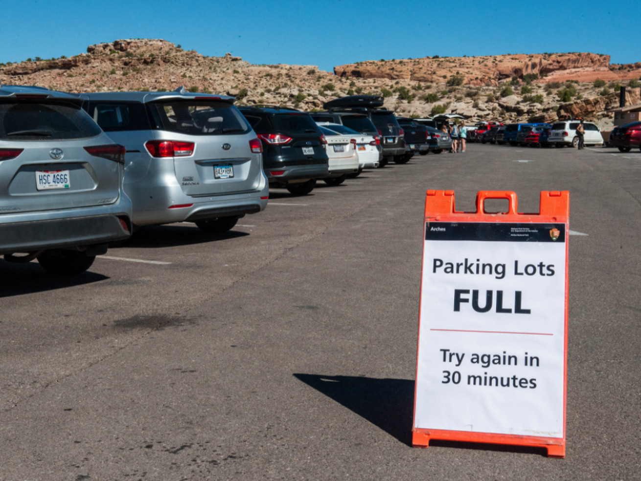 One of the full parking lots inside Arches National
Park is pictured in National Park Service photo from a Tweet on May
17, 2021. The Memorial Day holiday may be in the rearview mirror,
but Utah’s national parks and monuments continue to be at the front
of the line for tourists wanting to drive through some of the
state’s most spectacular scenery.